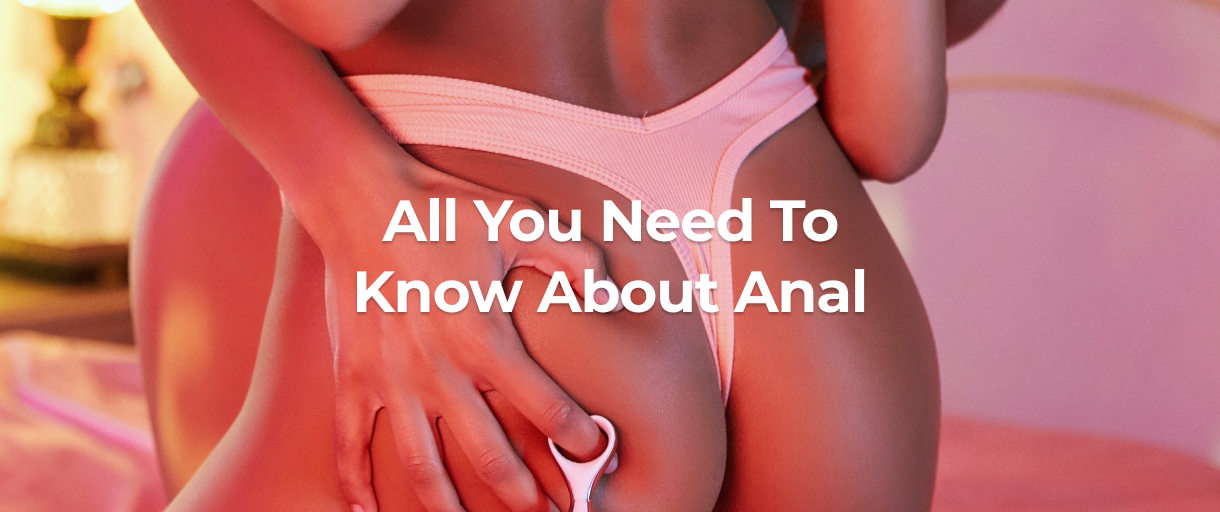 A man’s hand holding a woman’s butt.