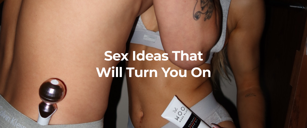 Couple holding toys and lubricant.