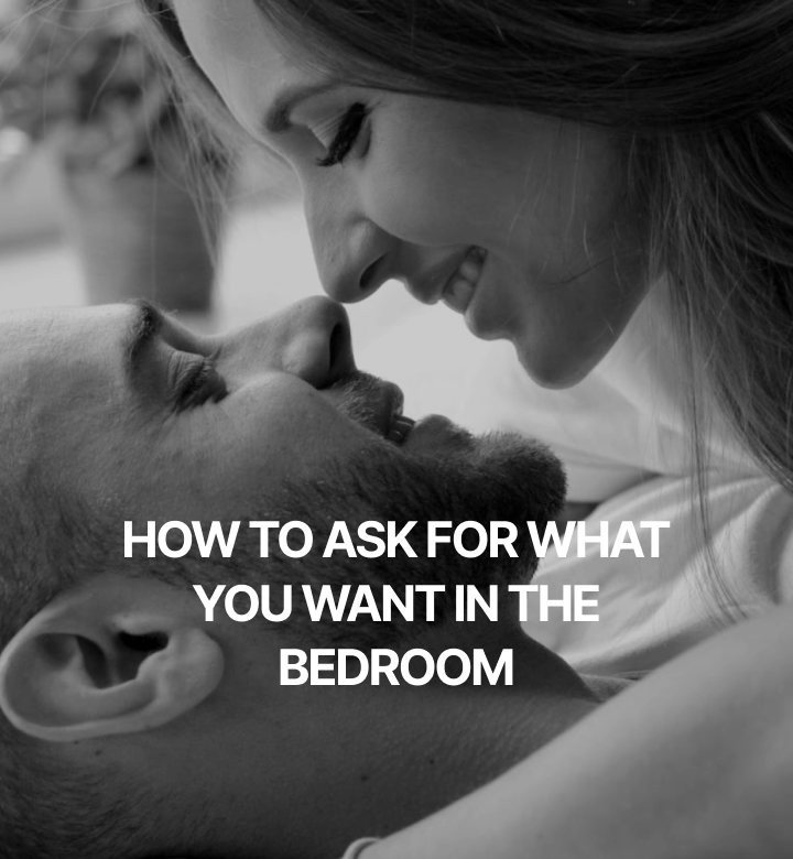 Close-up of woman on top of man in bed