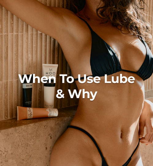 Person wearing a black bikini with lubes beside them
