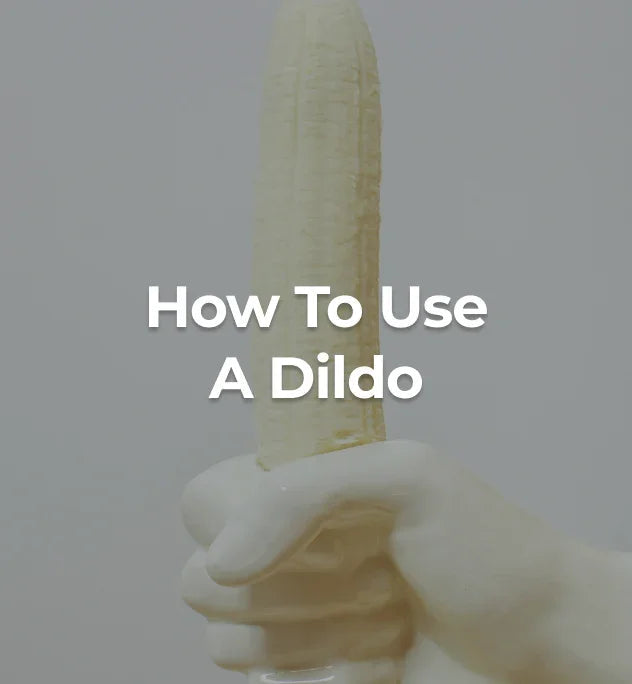 Hand holding a banana.