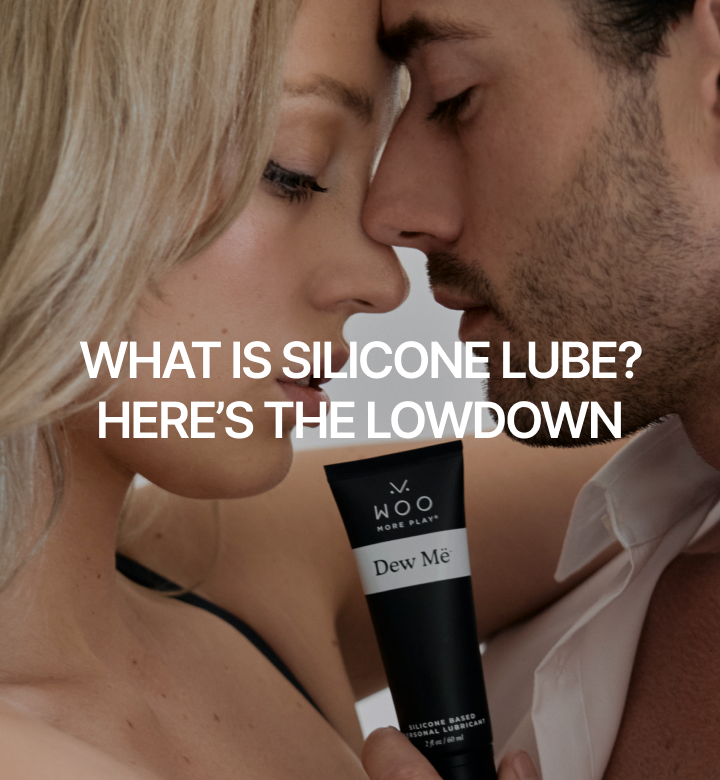 Man and woman in a close embrace, with WOO More Play Dew Më Lube in between them