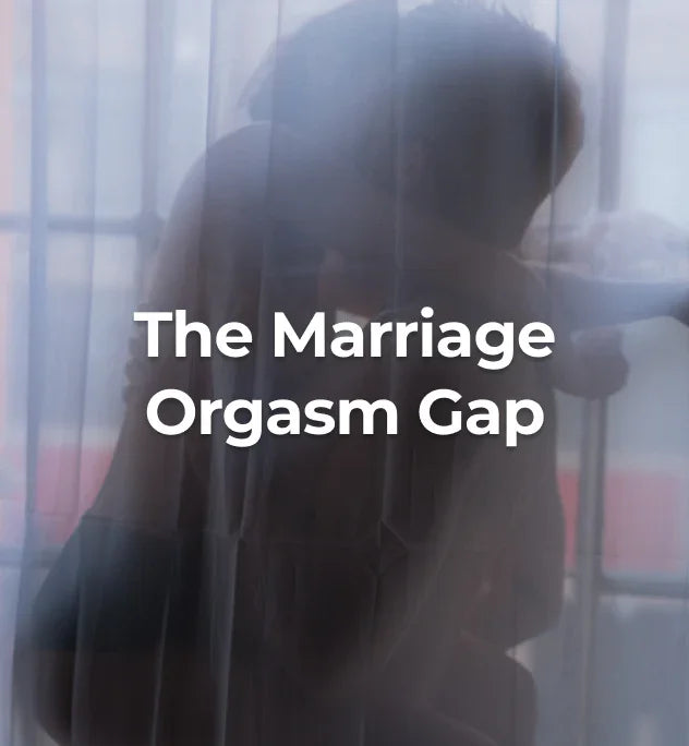 Two people kissing behind a curtain.