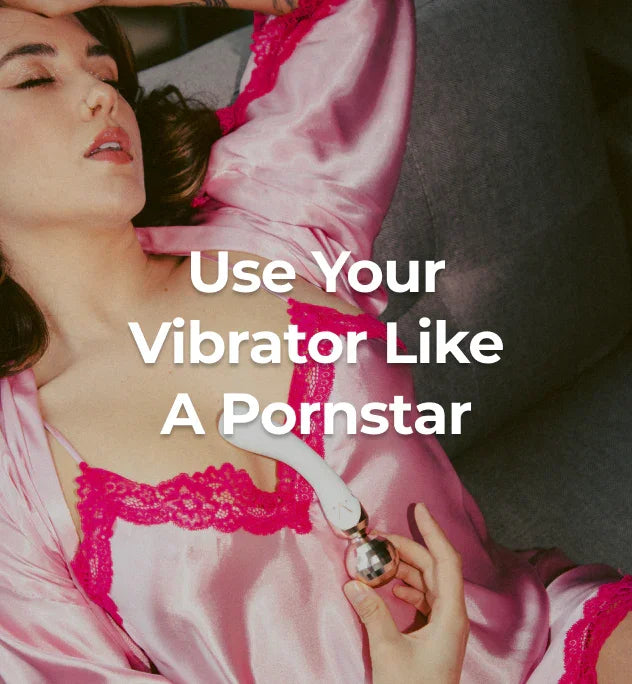 Person holding a g spot vibrator.