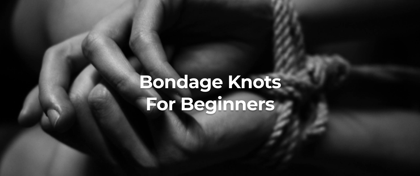 Black-and-white close-up of hands tied with rope