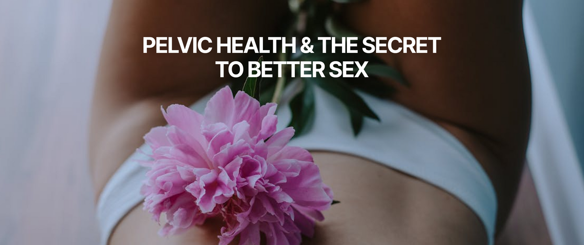 A pink flower on her stomach