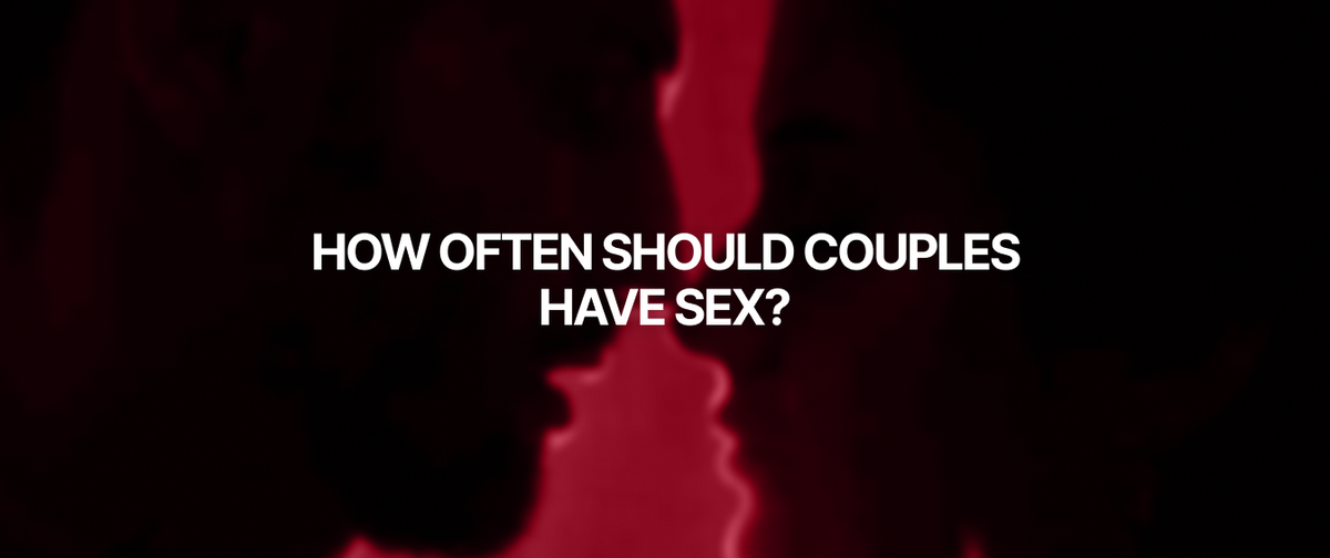 A red and black silhouette of a couple