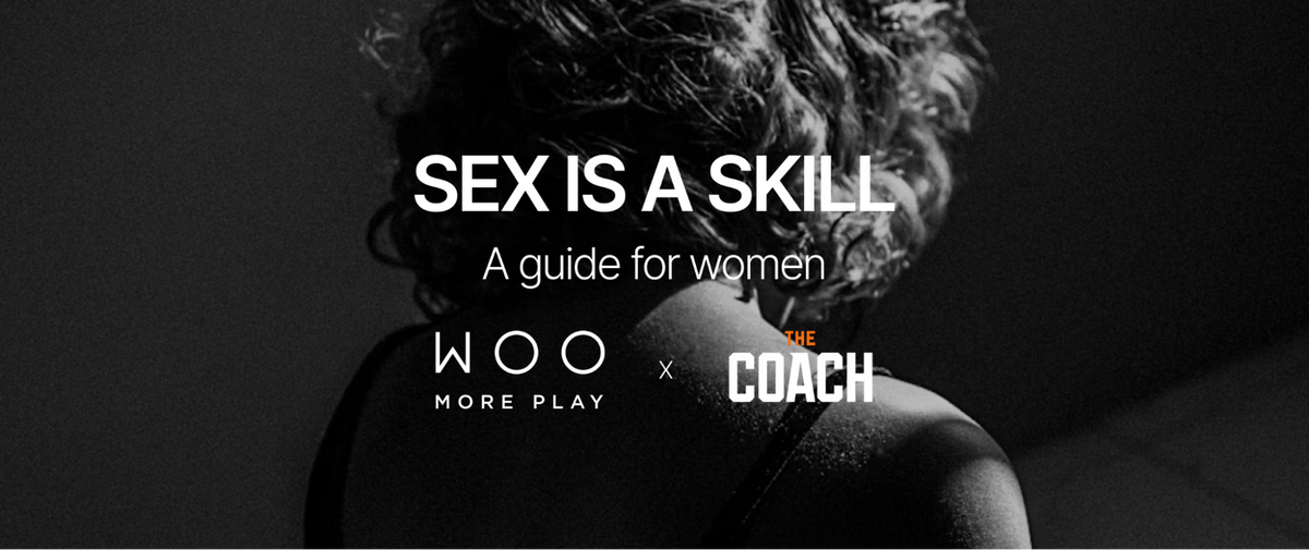 Black and white photo of a woman's bare back and curly hair